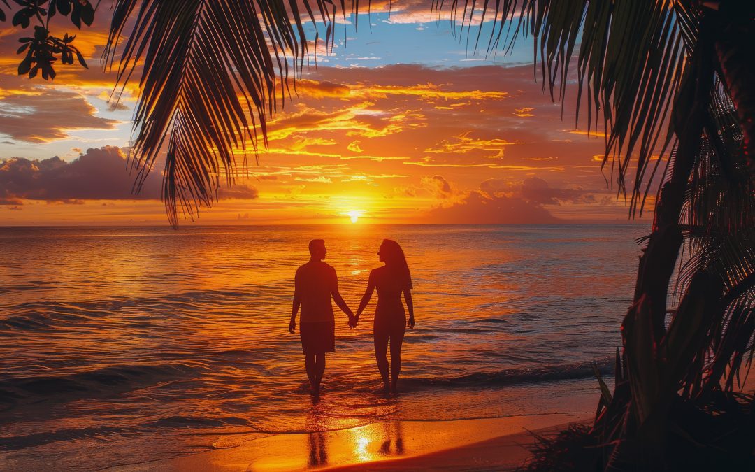 couple romantique sur la plage au coucher du soleil en Guadeloupe